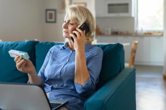 Woman calling the pharmacy about a medication