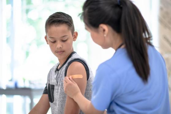 Child receiving a vaccine
